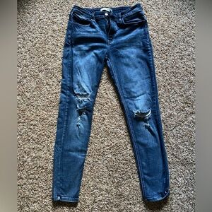 Stretchy ripped skinny jeans
